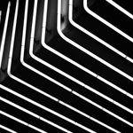 Cyan neon geometric lines in dark space