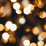 Glowing circular patterns on obsidian background